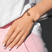 Pulseira magnética com cabo trançado (prata e ouro)